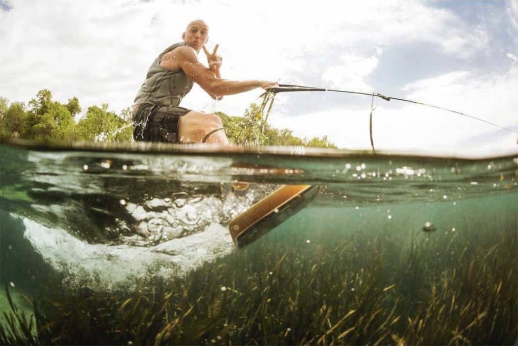 Reed Hansen wakeskating in a lake