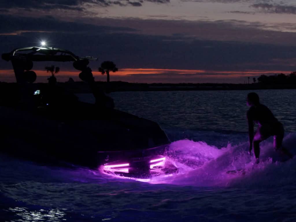 Wakesurfer Cassidy Gale rides her Malibu M240 at night