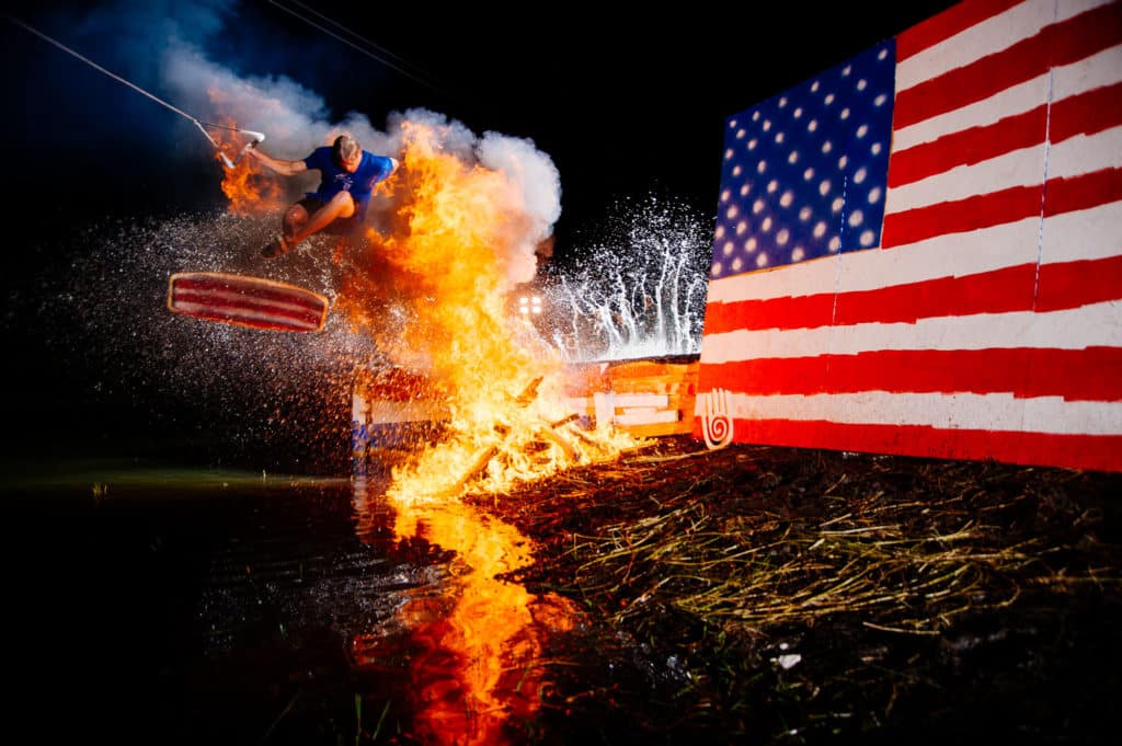 Stu Shinn kickflips through flames