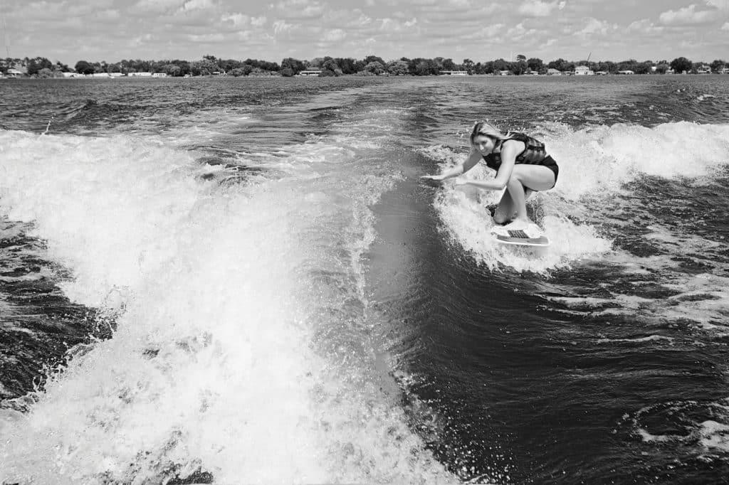 Wakesurfing behind a ski boat