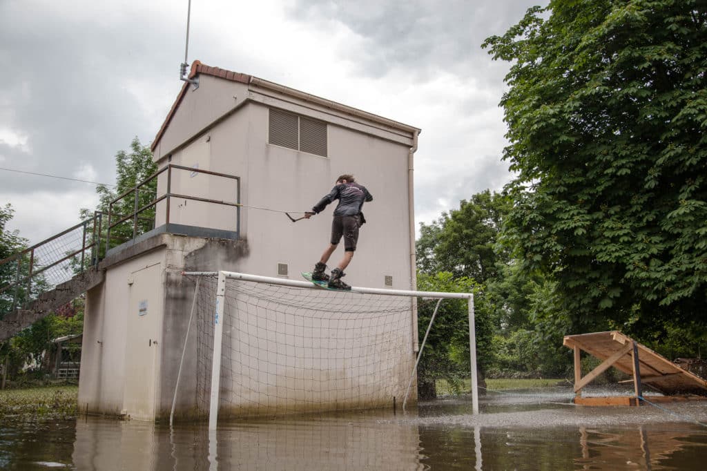 Ben Leclair over the soccer net