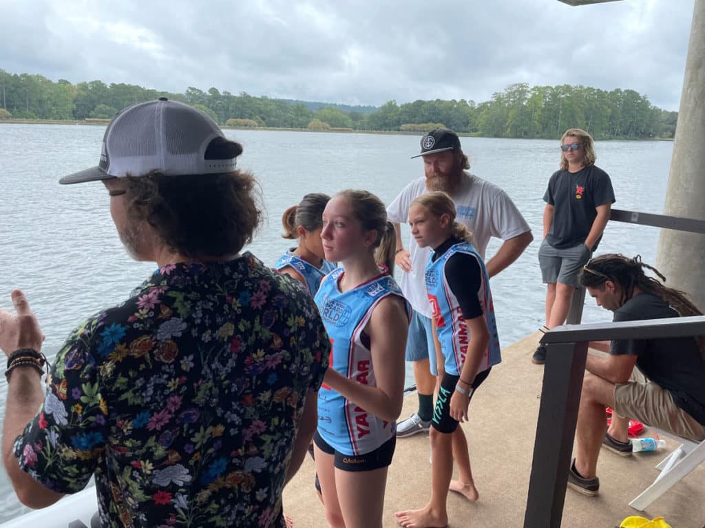 Competitors lined up on the dock