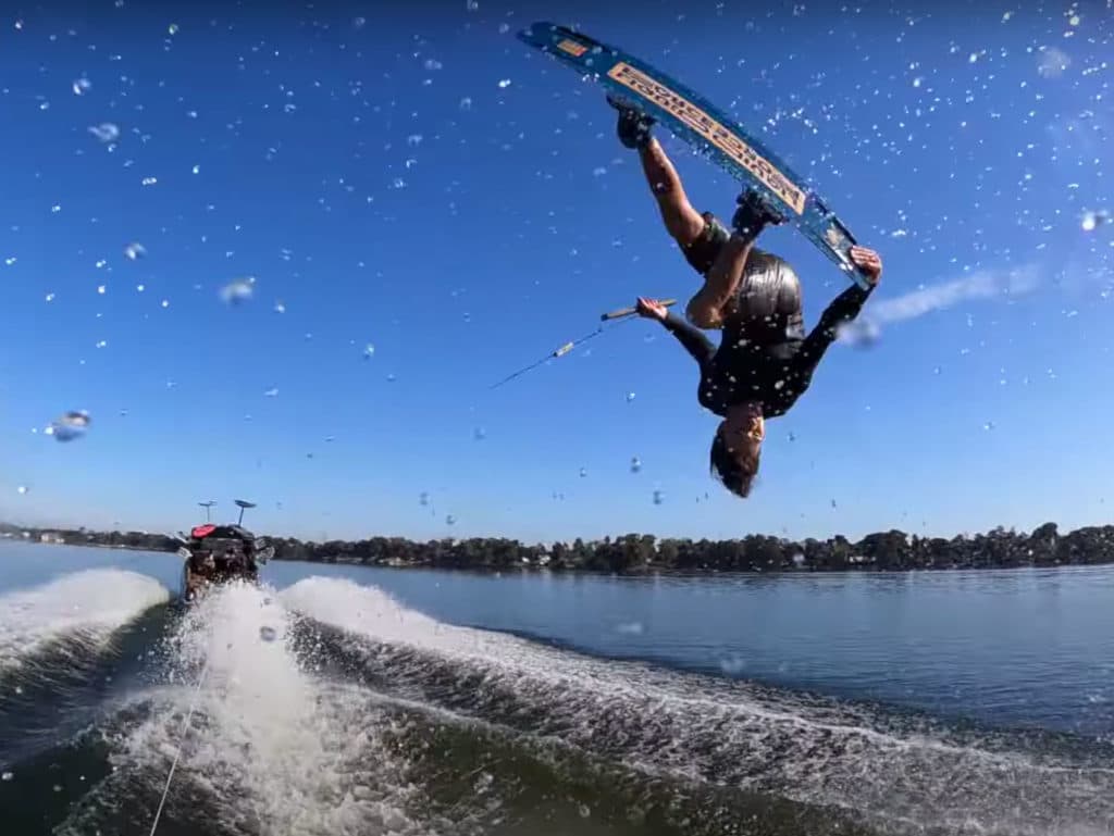 Guenther Oka boosting over the wake