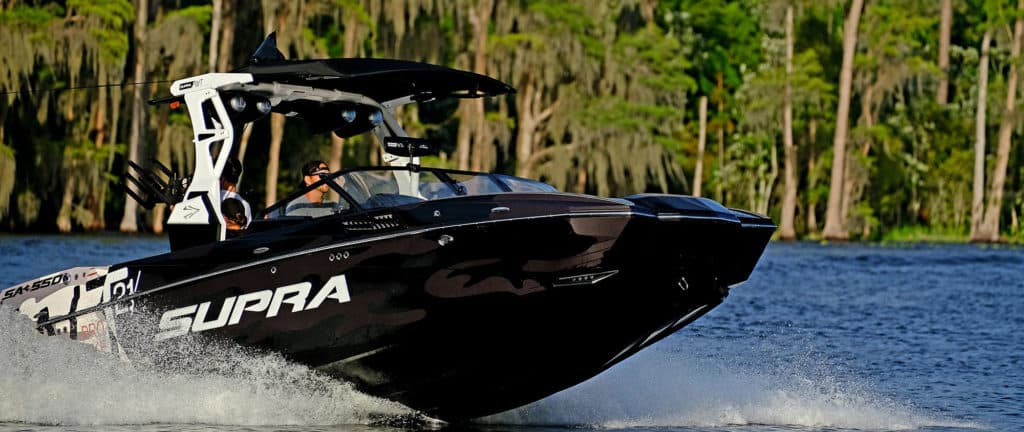 Wake boat running across the lake