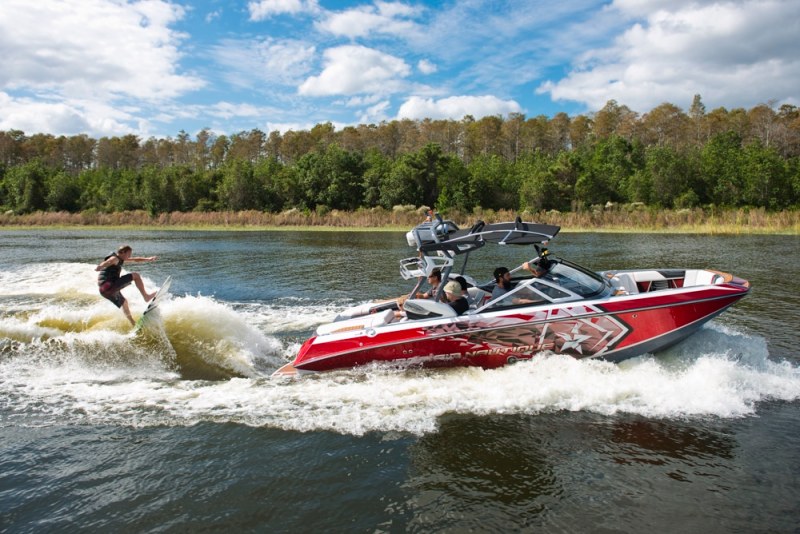 Wake surfing behind the 2014 Nautique G21