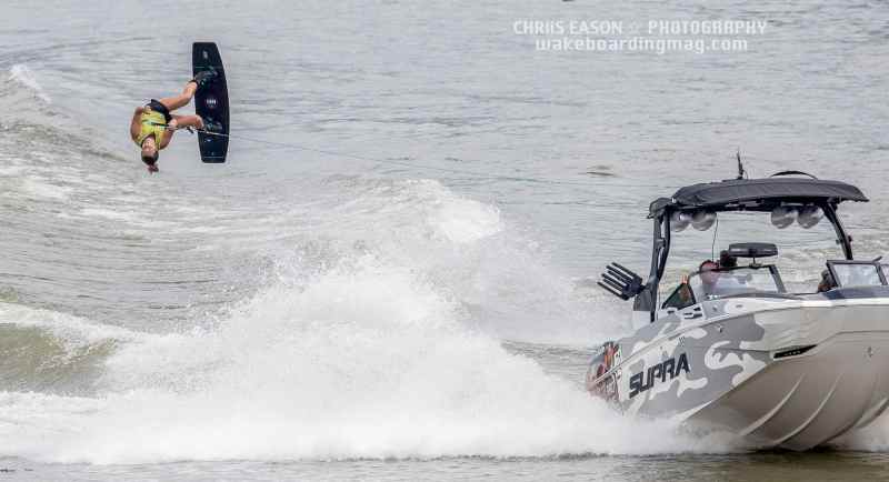 Jamie Lopina backflipping over the wake