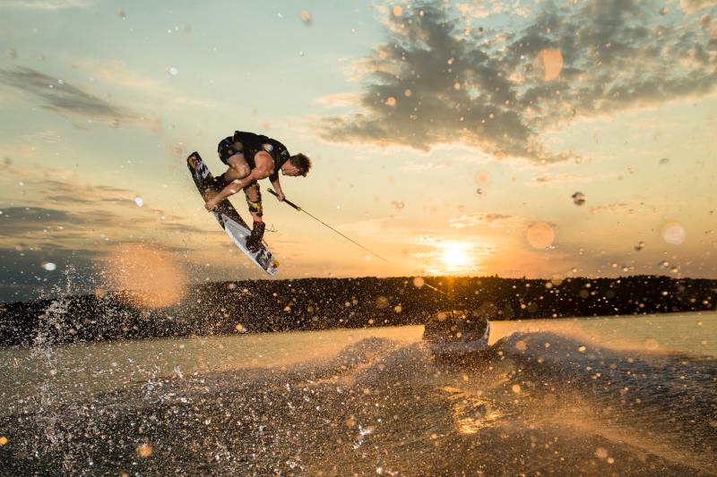 Mike Dowdy wakeboards on Lake Superior along the shores of  northern Wisconsin, USA on July 09, 2017.