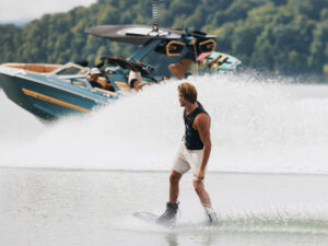 Wakeboarder wit Mastercraft boat in background