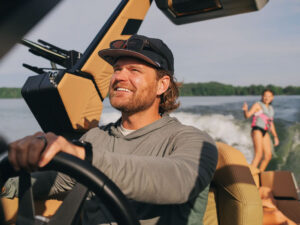 Wakesurfing behind a MasterCraft boat