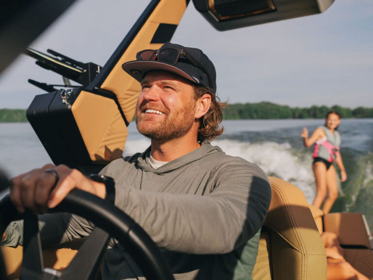 Wakesurfing behind a MasterCraft boat