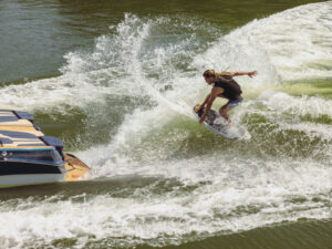 Wakesurfing behind a boat