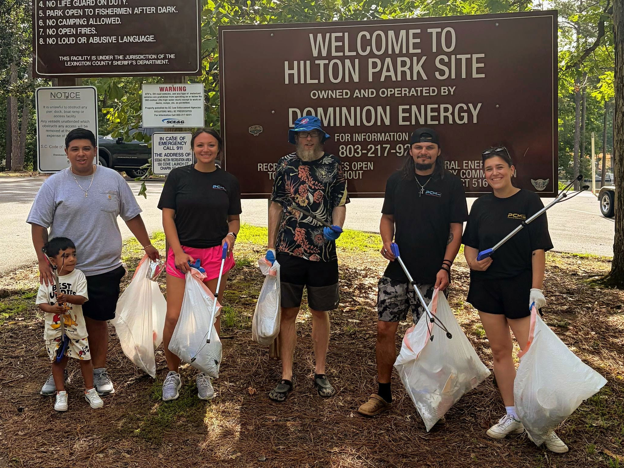 Pleasurecraft employees cleaning Lake Murray