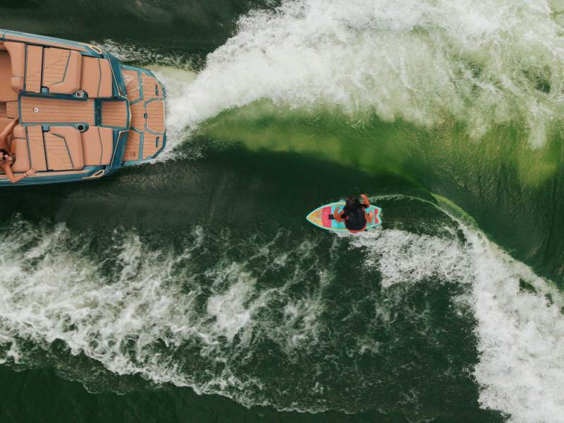 Wakesurfing behind a boat